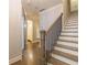 Stylish entryway with hardwood floors, coat hooks, and a view of a modern bathroom at 976 Memorial Se Walk, Atlanta, GA 30316