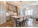 Open-concept kitchen featuring an island with seating, modern cabinets, and high-end appliances at 976 Memorial Se Walk, Atlanta, GA 30316