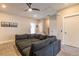 An open-concept living room features a comfy sectional sofa and neutral tones at 976 Memorial Se Walk, Atlanta, GA 30316