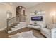 Inviting living room features modern fireplace, hardwood floors, and staircase access at 976 Memorial Se Walk, Atlanta, GA 30316