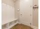 Well-organized mudroom featuring a built-in bench, coat hooks, and convenient storage solutions at 976 Memorial Se Walk, Atlanta, GA 30316