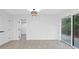 Spacious bedroom featuring wood floors and a sliding door that provides access to a deck at 1153 Dawn View Nw Ln, Atlanta, GA 30327