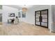 Dining room with modern furnishings and a large glass door leading to the outdoor space at 1153 Dawn View Nw Ln, Atlanta, GA 30327