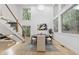 Bright and airy dining room featuring large windows and stylish modern decor at 1153 Dawn View Nw Ln, Atlanta, GA 30327