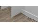Corner of the room featuring neutral tile flooring and modern white trim at 1153 Dawn View Nw Ln, Atlanta, GA 30327