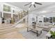 Bright living room with hardwood floors, lots of natural light and stair access to the second floor at 1153 Dawn View Nw Ln, Atlanta, GA 30327