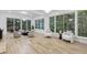 Spacious and bright living room with hardwood floors, plush neutral furniture and natural light at 1153 Dawn View Nw Ln, Atlanta, GA 30327