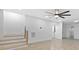Open-concept living room featuring hardwood floors and a staircase at 1153 Dawn View Nw Ln, Atlanta, GA 30327