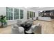 Spacious and bright living room with hardwood floors, plush neutral furniture and natural light at 1153 Dawn View Nw Ln, Atlanta, GA 30327