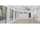 Bright and airy living room with large windows and access to a deck at 1153 Dawn View Nw Ln, Atlanta, GA 30327