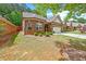 Beautiful, well-maintained brick home featuring manicured landscaping and an attached two-car garage at 2212 Nichols Valley Drive, Dacula, GA 30019