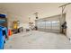 Spacious garage with ample storage space and an automatic door opener at 2212 Nichols Valley Drive, Dacula, GA 30019