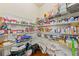 Organized walk-in pantry with wire shelving, storing canned goods, boxes, and household items at 2212 Nichols Valley Drive, Dacula, GA 30019