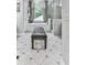 Bright bathroom showcasing a tub and shower and tile flooring at 302 Gilmer Ct, Canton, GA 30115