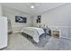 Cozy bedroom featuring a comfortable bed, soft carpet, and a minimalist aesthetic at 302 Gilmer Ct, Canton, GA 30115