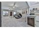Living room featuring a seating area, mini-fridge, bar area, and dining table at 302 Gilmer Ct, Canton, GA 30115