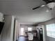 Open concept kitchen with white cabinets, stainless steel appliances, granite countertops, and island at 3242 Cascade Parc Sw Blvd, Atlanta, GA 30311