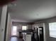 Kitchen features white cabinets, stainless steel appliances, granite countertops, and a center island at 3242 Cascade Parc Sw Blvd, Atlanta, GA 30311