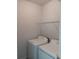 Convenient laundry room with washer, dryer, and a wire rack for storage at 3242 Cascade Parc Sw Blvd, Atlanta, GA 30311