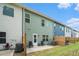 Exterior backyard view with a small patio and fenced-in yard perfect for relaxing outdoors at 2140 Ravencliff Dr, Austell, GA 30168
