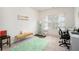 Bright bedroom with large window, stylish décor, workspace and comfortable seating area at 2140 Ravencliff Dr, Austell, GA 30168