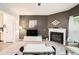Comfortable living room featuring neutral tones, a fireplace, and plenty of natural light for a welcoming atmosphere at 2140 Ravencliff Dr, Austell, GA 30168