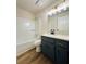 Stylish bathroom features updated vanity, new fixtures, and a shower-tub combo at 2535 Impala Dr, Cumming, GA 30041