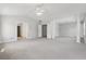 Spacious bonus room with plush carpet, an open layout, and easy access to other rooms at 3134 Flery Way, Lawrenceville, GA 30046