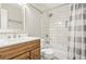 Bathroom features a single vanity, tub, and shower with modern fixtures at 5070 Saddle Bridge Ln, Alpharetta, GA 30022