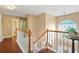 Hallway with hardwood floors and large window at 5070 Saddle Bridge Ln, Alpharetta, GA 30022