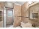 Elegant bathroom showcasing tiled walls, a glass shower, and a vanity with stylish fixtures at 578 Laney Rd, Locust Grove, GA 30248