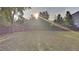 Large backyard with a wooden fence at 6170 Winston Trce, Mcdonough, GA 30252