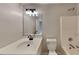 Bathroom with a white vanity, toilet, and shower at 6170 Winston Trce, Mcdonough, GA 30252