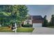 Two-story brick home with a two-car garage, lawn and landscaping at 6170 Winston Trce, Mcdonough, GA 30252