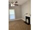 Bedroom featuring a ceiling fan, window with blinds, and a decorative fireplace at 1234 Triple Hill Dr, Macon, GA 30084