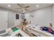 Comfortable bedroom provides ample space and natural light for play and rest at 3982 Ivory Gables Pl, Buford, GA 30519