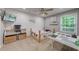 Playful bedroom features a bed, toy storage, and a mounted flat-screen TV at 3982 Ivory Gables Pl, Buford, GA 30519