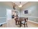 Dining area with a round table, chairs, and deer head wall decor at 3982 Ivory Gables Pl, Buford, GA 30519