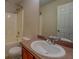 Well-lit bathroom with a vanity, large mirror, and a shower-tub combination at 4952 Terrace Dr, Ellenwood, GA 30294