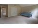Bedroom with carpet, double closet doors, and vaulted ceilings at 4952 Terrace Dr, Ellenwood, GA 30294