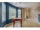 Dining area with views to backyard and open to other living spaces at 4952 Terrace Dr, Ellenwood, GA 30294