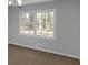 This bedroom features a large window for tons of natural light at 1038 Seven Springs Cir, Marietta, GA 30068