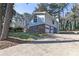 Two-story home exterior with a two-car garage and private driveway at 1038 Seven Springs Cir, Marietta, GA 30068