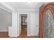 Inviting foyer features hardwood floors, closet and interior doors at 1038 Seven Springs Cir, Marietta, GA 30068
