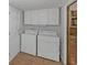 Convenient laundry room with washer, dryer, and plenty of storage at 1038 Seven Springs Cir, Marietta, GA 30068