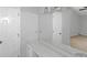 A spacious bathroom features a makeup vanity and a separate door to a closet at 1038 Seven Springs Cir, Marietta, GA 30068