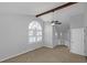 This main bedroom features neutral paint, carpet, ceiling fan, vaulted ceiling, and ensuite bathroom at 1038 Seven Springs Cir, Marietta, GA 30068