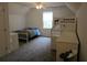 Comfortable bedroom with carpeted floors, ceiling fan and a bunk bed at 27 Edgar Ct, Hiram, GA 30141