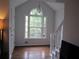 Bright entryway with hardwood floors, white trim, and a window view that brings in natural light at 27 Edgar Ct, Hiram, GA 30141