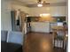 Modern kitchen featuring stainless steel appliances, white cabinets, and hardwood floors at 27 Edgar Ct, Hiram, GA 30141